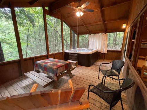 Cabin 4 Hot Tub on screen porch