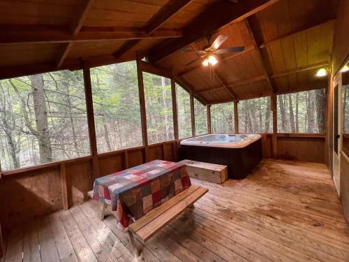 Cabin 3 Hot Tub on screen porch